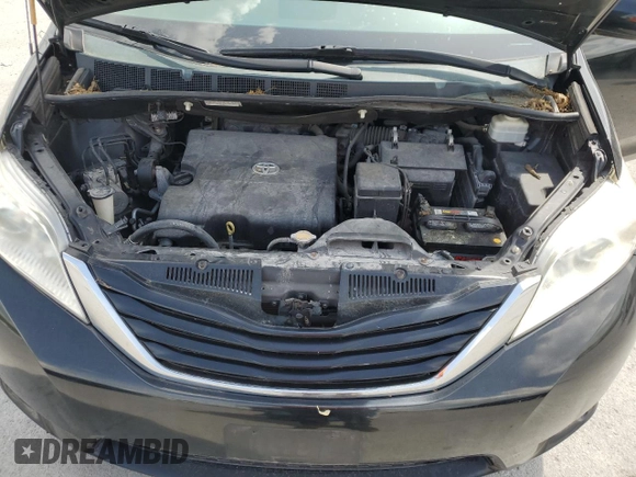 2014 Toyota Sienna LE with VIN 5TDJK3DC9ES087180, listed as a Copart auction lot 54420785 with 107,993 mi miles and Salvage title. Bid and sale history available at DreamBid. Image 12.
