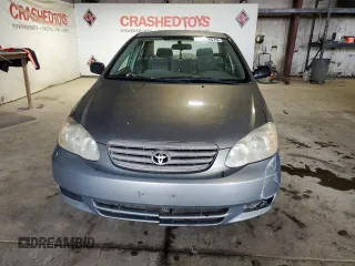 2004 Toyota Corolla CE with VIN 1NXBR32E94Z257743, listed as a Copart auction lot 54259575 with 299,999 mi miles and Clean Title. Bid and sale history available at DreamBid. Image 5.