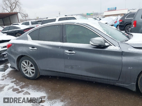 2015 Infiniti Q50 Premium with VIN JN1BV7AR0FM396192, listed as a IAAI auction lot 41564677 with 210,460 mi miles and . Bid and sale history available at DreamBid. Image 14.
