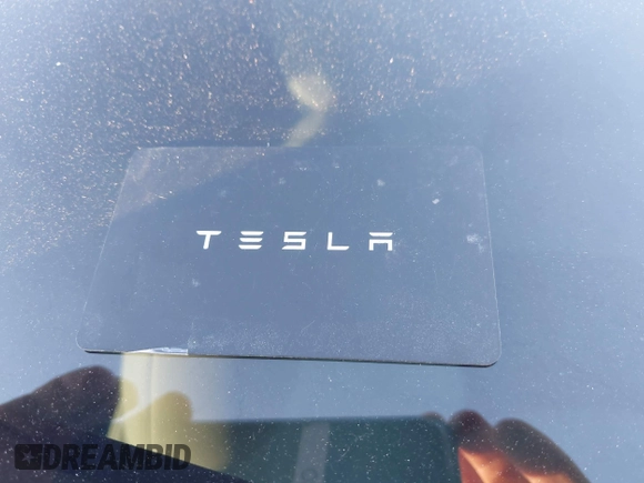 2023 Tesla Model 3 with VIN 5YJ3E1EAXPF486639, listed as a IAAI auction lot 41387797 with 18,603 mi miles and . Bid and sale history available at carsss.com. Image 11.