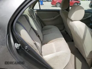 2006 Toyota Corolla CE z VIN 1NXBR32E46Z702893, wystawiony jako Copart lot #55446655 z przebiegiem 269 124 mil mil oraz Szkoda całkowita • Salvage title. Historia ofert i sprzedaży dostępna na DreamBid. Obrazek 10.