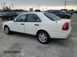 1997 Mercedes-Benz C with VIN WDBHA28E3VF582237, listed as a Copart auction lot 76826534 with 240,702 mi miles and Clean Title. Bid and sale history available at carsss.com. Image 2.