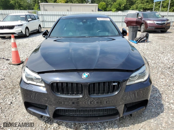2016 BMW M5 with VIN WBSFV9C55GD595799, listed as a Copart auction lot 65708864 with 104,198 mi miles and Salvage Title. Bid and sale history available at carsss.com. Image 5.