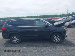 2021 Honda Pilot EX-L with VIN 5FNYF6H53MB097089, listed as a IAAI auction lot 42309359 with 58,371 mi miles and . Bid and sale history available at DreamBid. Image 14.
