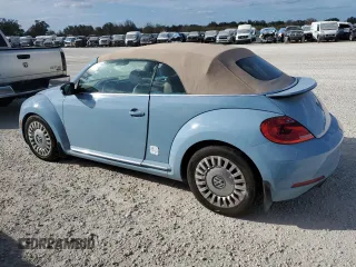2015 Volkswagen Beetle 1.8T with VIN 3VW517AT6FM800888, listed as a Copart auction lot 76752664 with Not provided miles and Salvage title. Bid and sale history available at DreamBid. Image 2.