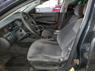 2015 Chevrolet Impala LS with VIN 2G1WA5E36F1171137, listed as a Copart auction lot 63060935 with 148,000 mi miles and Salvage title. Bid and sale history available at DreamBid. Image 7.