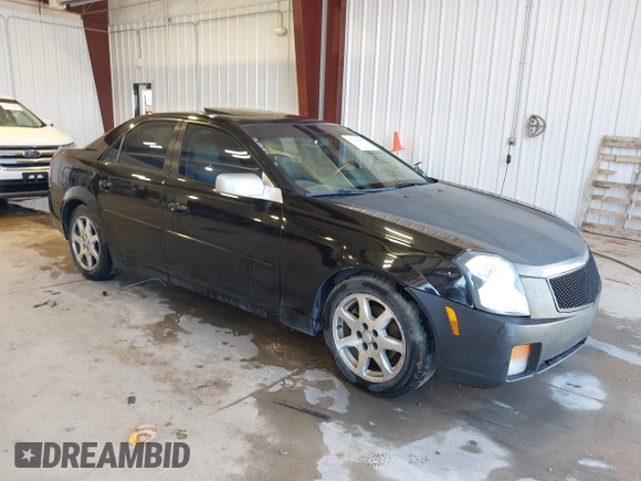 2003 Cadillac CTS with VIN 1G6DM57N630145426, listed as a IAAI auction lot 42141105 with 203,859 mi miles. Bid and sale history available at carsss.com. Image 1.