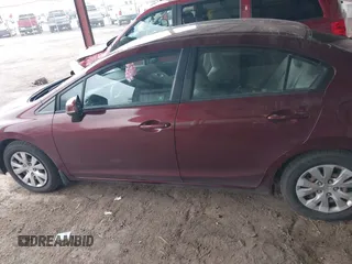 2012 Honda Civic LX z VIN 2HGFB2F50CH596442, wystawiony jako IAAI lot #42160402 z przebiegiem 130 152 mil mil oraz . Historia ofert i sprzedaży dostępna na DreamBid. Obrazek 14.