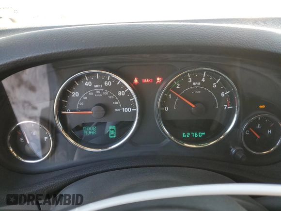 2017 Jeep Wrangler Willys Wheeler with VIN 1C4AJWAG2HL638213, listed as a Copart auction lot 88121675 with 62,760 mi miles and Salvage Title. Bid and sale history available at DreamBid. Image 9.