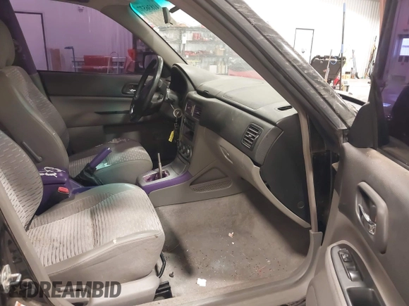2003 Subaru Forester XS with VIN JF1SG65643H755247, listed as a IAAI auction lot 41836577 with 184,677 mi miles. Bid and sale history available at carsss.com. Image 5.