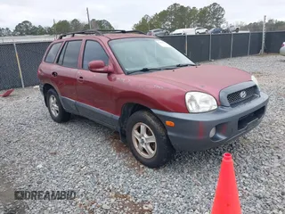 2002 Hyundai Santa Fe GLS with VIN KM8SC73D72U306997, listed as a IAAI auction lot 41519773 with 244,398 mi miles. Bid and sale history available at carsss.com. Image 1.