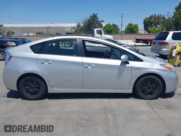 2015 Toyota Prius Four z VIN JTDKN3DU0F0415952, wystawiony jako IAAI lot #42402823 z przebiegiem 272 110 mil mil oraz . Historia ofert i sprzedaży dostępna na DreamBid. Obrazek 13.