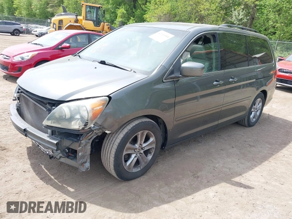 2008 Honda Odyssey Touring with VIN 5FNRL38908B100051, listed as a IAAI auction lot 42110484 with 190,567 mi miles and . Bid and sale history available at DreamBid. Image 2.