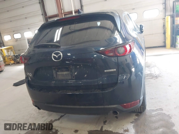 2020 Mazda CX-5 Touring with VIN JM3KFBCM6L0739077, listed as a IAAI auction lot 41810946 with 82,911 mi miles and . Bid and sale history available at carsss.com. Image 16.