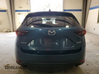 2018 Mazda CX-5 Touring with VIN JM3KFACM9J1445724, listed as a Copart auction lot 50469245 with 0 mi miles and Salvage Title. Bid and sale history available at carsss.com. Image 6.