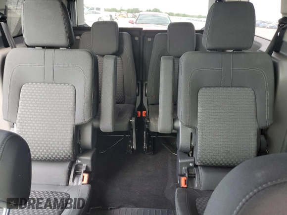 2021 Ford Transit Connect XLT with VIN NM0GE9F28M1500501, listed as a Copart auction lot 50764445 with 24,638 mi miles and Salvage title. Bid and sale history available at DreamBid. Image 10.