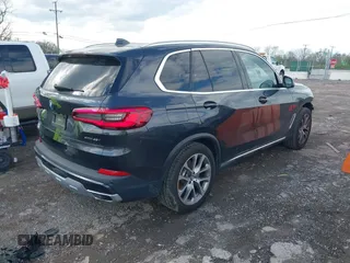2020 BMW X5 xDrive40i with VIN 5UXCR6C08L9B56211, listed as a IAAI auction lot 41967486 with 51,973 mi miles. Bid and sale history available at carsss.com. Image 4.
