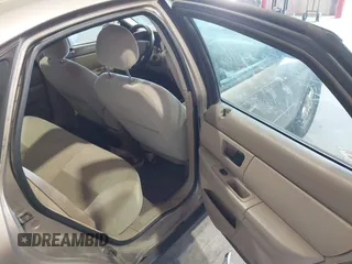 2006 Ford Taurus SE with VIN 1FAFP53U46A123827, listed as a IAAI auction lot 42042946 with 146,393 mi miles. Bid and sale history available at carsss.com. Image 8.