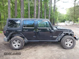 2012 Jeep Wrangler Unlimited Call of Duty MW3 with VIN 1C4BJWFG5CL103267, listed as a IAAI auction lot 42334345 with 135,324 mi miles and . Bid and sale history available at DreamBid. Image 14.