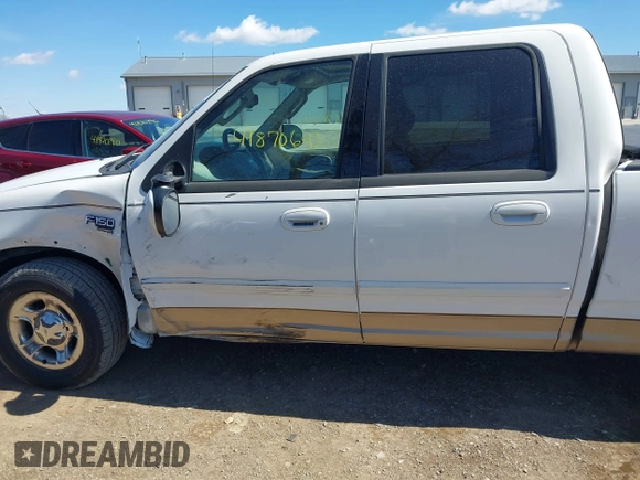 2003 Ford F-150 XLT with VIN 1FTRW07663KD57580, listed as a IAAI auction lot 41870643 with 256,497 mi miles. Bid and sale history available at carsss.com. Image 14.