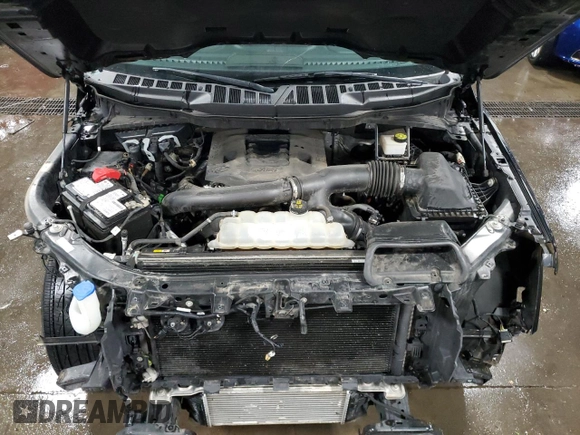 2022 Ford F-150 XL with VIN 1FTFW1E82NFA29355, listed as a Copart auction lot 60212125 with 89,709 mi miles and Salvage title. Bid and sale history available at DreamBid. Image 11.
