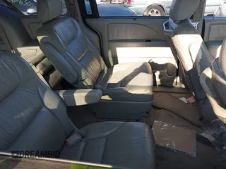 2008 Honda Odyssey EX-L with VIN 5FNRL38718B053448, listed as a IAAI auction lot 40182359 with 164,902 mi miles and . Bid and sale history available at DreamBid. Image 8.