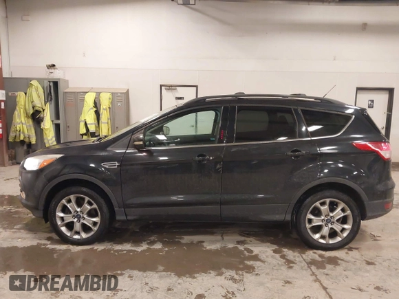2013 Ford Escape SEL with VIN 1FMCU9H96DUC64584, listed as a IAAI auction lot 41357053 with 139,422 mi miles. Bid and sale history available at carsss.com. Image 14.