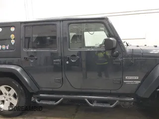 2018 Jeep Wrangler JK Unlimited Sport with VIN 1C4BJWDG9JL890272, listed as a IAAI auction lot 41551844 with 77,655 mi miles. Bid and sale history available at carsss.com. Image 14.