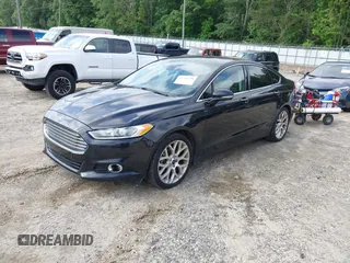 2013 Ford Fusion Titanium z VIN 3FA6P0K94DR375113, wystawiony jako IAAI lot #42265790 z przebiegiem 152 160 mil mil oraz . Historia ofert i sprzedaży dostępna na DreamBid. Obrazek 2.