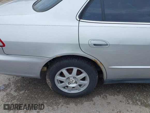 2002 Honda Accord SE с VIN 1HGCG56712A088663, выставлен на аукционе IAAI как лот 42520639 с пробегом 2 304 496 миль миль и . История ставок и продаж доступна на DreamBid. Изображение 13.