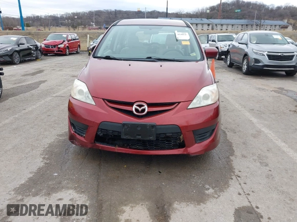 2009 Mazda Mazda5 Sport with VIN JM1CR293X90339440, listed as a IAAI auction lot 41525453 with 173,640 mi miles. Bid and sale history available at carsss.com. Image 6.