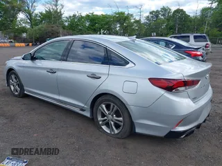 2019 Hyundai Sonata Sport z VIN 5NPE34AFXKH740037, wystawiony jako IAAI lot #42215038 z przebiegiem 79 714 mil mil oraz . Historia ofert i sprzedaży dostępna na DreamBid. Obrazek 3.