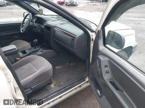 2000 Jeep Grand Cherokee Laredo z VIN 1J4G248S2YC339997, wystawiony jako IAAI lot #42395079 z przebiegiem 261 704 mil mil oraz . Historia ofert i sprzedaży dostępna na DreamBid. Obrazek 5.