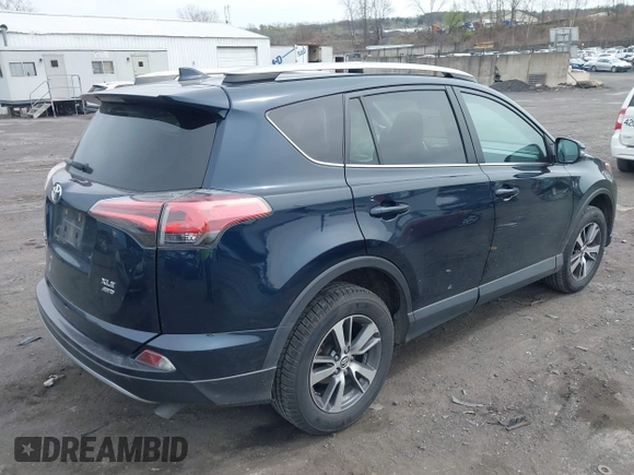 2018 Toyota RAV4 XLE with VIN 2T3RFREV9JW746782, listed as a IAAI auction lot 42065755 with 61,219 mi miles. Bid and sale history available at carsss.com. Image 4.