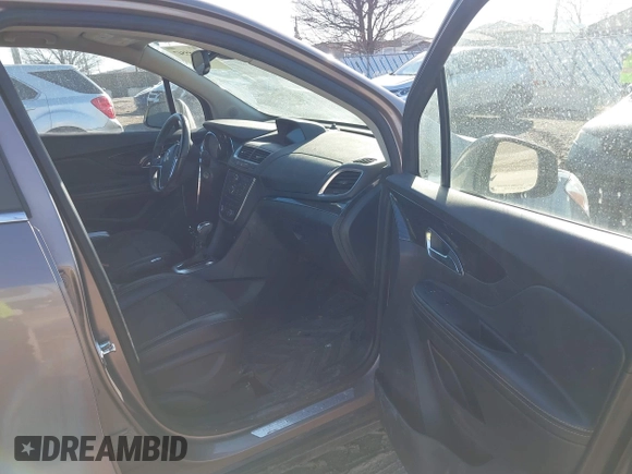 2014 Buick Encore Convenience with VIN KL4CJBSB5EB742534, listed as a IAAI auction lot 41655547 with 63,199 mi miles and . Bid and sale history available at DreamBid. Image 5.