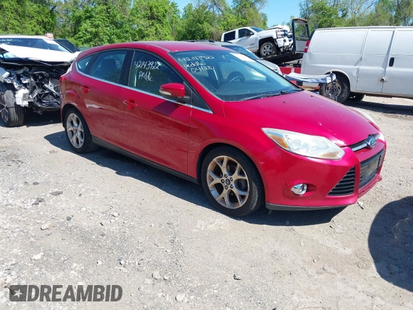 2012 Ford Focus SEL with VIN 1FAHP3M22CL335913, listed as a IAAI auction lot 42143922 with 129,421 mi miles. Bid and sale history available at carsss.com. Image 1.