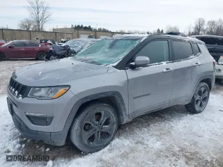 2019 Jeep Compass Latitude with VIN 3C4NJDBB5KT657245, listed as a IAAI auction lot 41403429 with 80,296 mi miles. Bid and sale history available at carsss.com. Image 2.