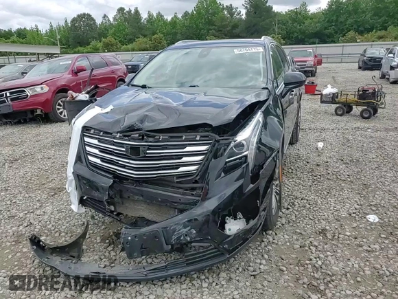 2019 Cadillac XT5 Luxury FWD с VIN 1GYKNCRS7KZ104400, выставлен на аукционе Copart как лот 58704715 с пробегом 80 676 миль миль и Списание • Salvage title. История ставок и продаж доступна на DreamBid. Изображение 14.