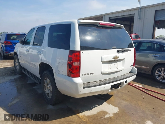 2010 Chevrolet Tahoe LS with VIN 1GNMCAE3XAR215407, listed as a IAAI auction lot 42185643 with 201,070 mi miles and . Bid and sale history available at DreamBid. Image 3.