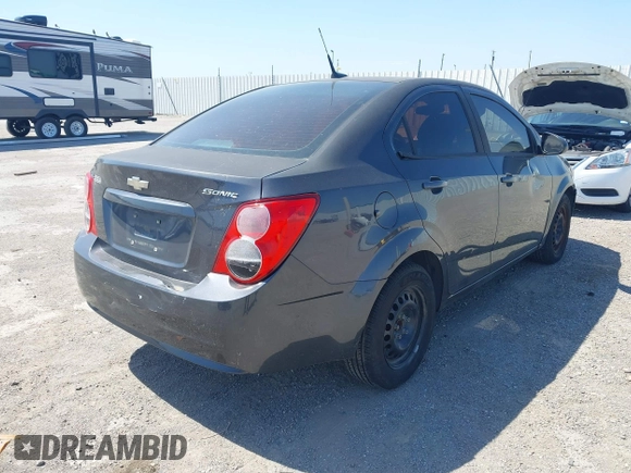 2013 Chevrolet Sonic LS with VIN 1G1JA5SH2D4112064, listed as a IAAI auction lot 42043168 with 215,480 mi miles and . Bid and sale history available at DreamBid. Image 4.