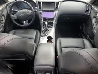 2014 Infiniti Q50 Premium with VIN JN1BV7APXEM675338, listed as a Copart auction lot 57125045 with 58,267 mi miles and Salvage title. Bid and sale history available at DreamBid. Image 8.