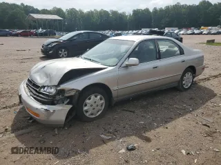 1996 Honda Accord LX with VIN 1HGCD5638TA093463, listed as a Copart auction lot 60174595 with 154,571 mi miles and Clean title. Bid and sale history available at DreamBid. Image 1.