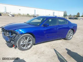 2021 Dodge Charger SXT with VIN 2C3CDXJG0MH601422, listed as a IAAI auction lot 40644896 with 64,836 mi miles. Bid and sale history available at carsss.com. Image 17.