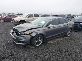 2014 Ford Fusion Titanium with VIN 3FA6P0K90ER317209, listed as a IAAI auction lot 41765326 with 89,942 mi miles. Bid and sale history available at carsss.com. Image 17.