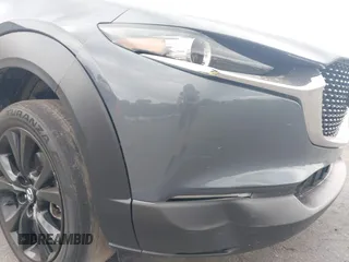 2022 Mazda CX-30 S Carbon Edition with VIN 3MVDMBCL6NM431985, listed as a IAAI auction lot 42610558 with Not provided miles and . Bid and sale history available at DreamBid. Image 6.