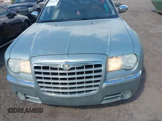 2006 Chrysler 300 C with VIN 2C3LA63H46H290377, listed as a IAAI auction lot 42035128 with 103,847 mi miles and . Bid and sale history available at carsss.com. Image 6.