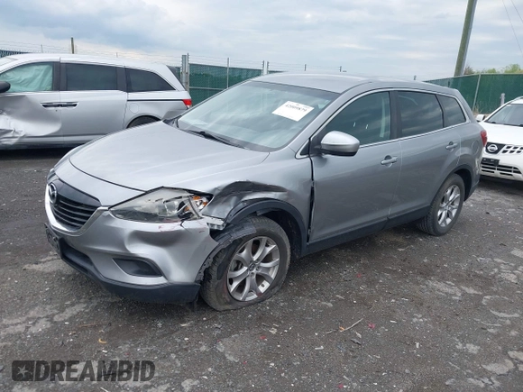 2015 Mazda CX-9 Sport with VIN JM3TB3BV2F0454770, listed as a IAAI auction lot 42009879 with 98,916 mi miles and . Bid and sale history available at carsss.com. Image 17.