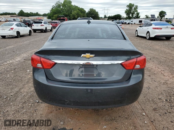 2014 Chevrolet Impala LS z VIN 1G11Y5SL5EU123450, wystawiony jako Copart lot #61414955 z przebiegiem 96 066 mil mil oraz Czysty tytuł • Clean title. Historia ofert i sprzedaży dostępna na DreamBid. Obrazek 6.