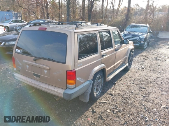 1999 Jeep Cherokee Sport with VIN 1J4FF68S2XL554452, listed as a IAAI auction lot 41930116 with 194,230 mi miles and . Bid and sale history available at DreamBid. Image 4.