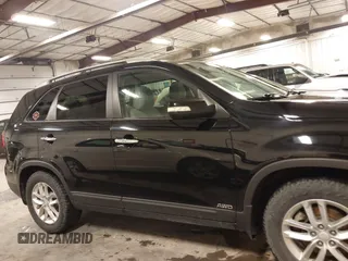 2015 Kia Sorento LX with VIN 5XYKTCA66FG573928, listed as a IAAI auction lot 42017586 with 174,939 mi miles. Bid and sale history available at carsss.com. Image 13.